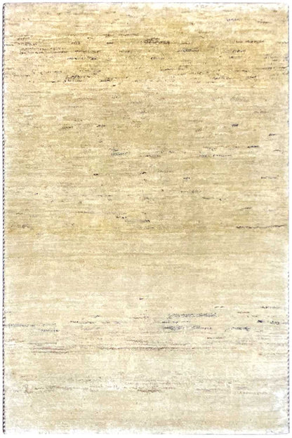 Rectangular Gabbeh rug in natural beige with subtle, even color gradients.