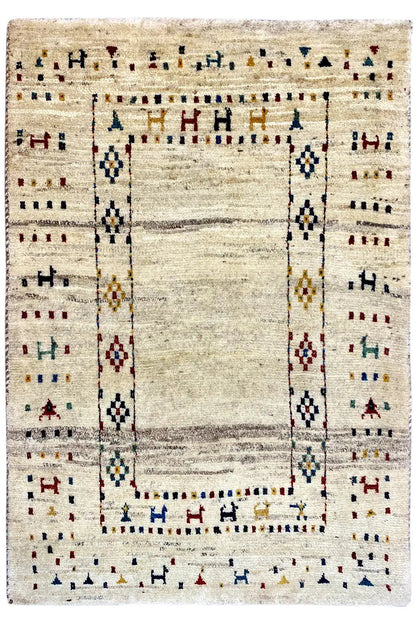 Gabbeh rug with a beige background, borders, and a central rectangular medallion
