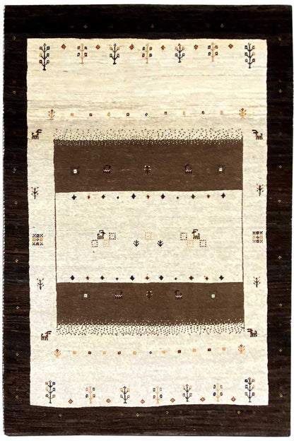 Gabbeh rug 175×117 cm: cream-colored field, brown central area, decorative small-scale patterns