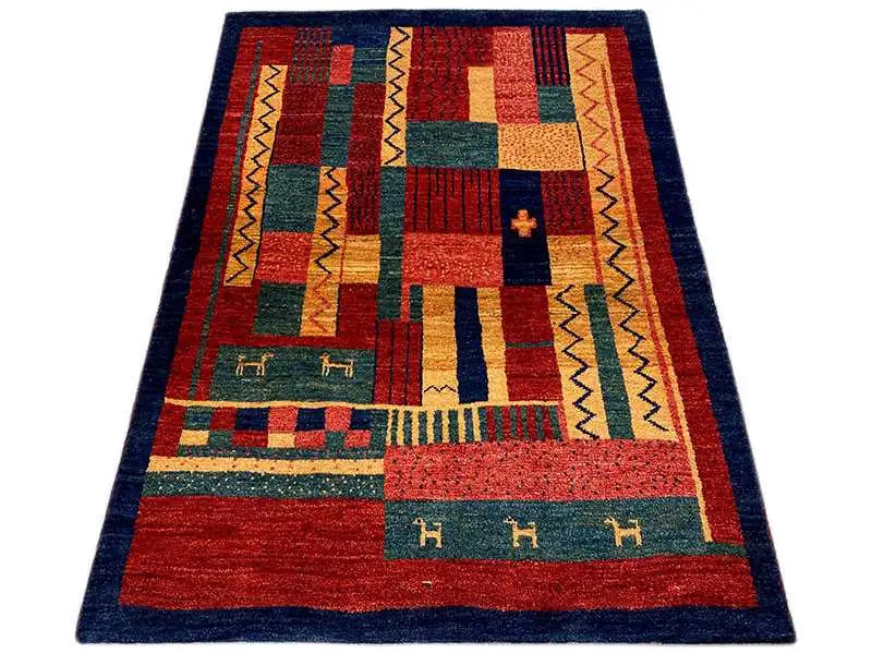 Gabbeh rug 140x100 cm with geometric patchwork in red, blue, green, and beige