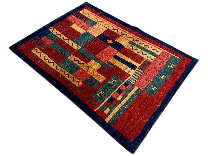 Gabbeh rug 140x100 cm with a square pattern and zigzag border in red, blue, and green