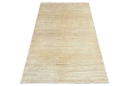 Gabbeh rug 174x110 cm, light beige, abstract linear design, photographed in trapezoidal perspective
