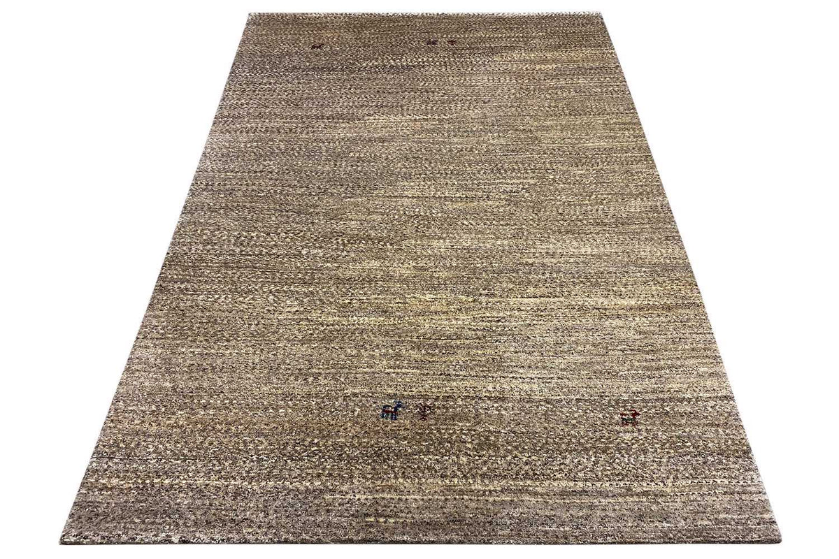 Rectangular rug with an all-over beige-gray woven pattern and small red/blue dots