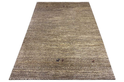 Rectangular rug with an all-over beige-gray woven pattern and small red/blue dots