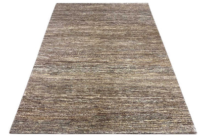 Gabbeh rug, an even mottled pattern in brown and gray