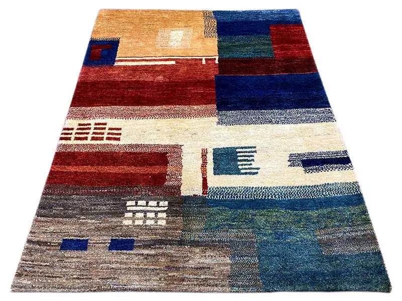 Gabbeh rug with a geometric pattern in red, blue, and beige, 214x147 cm