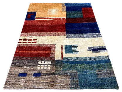 Gabbeh rug with a geometric pattern in red, blue, and beige, 214x147 cm