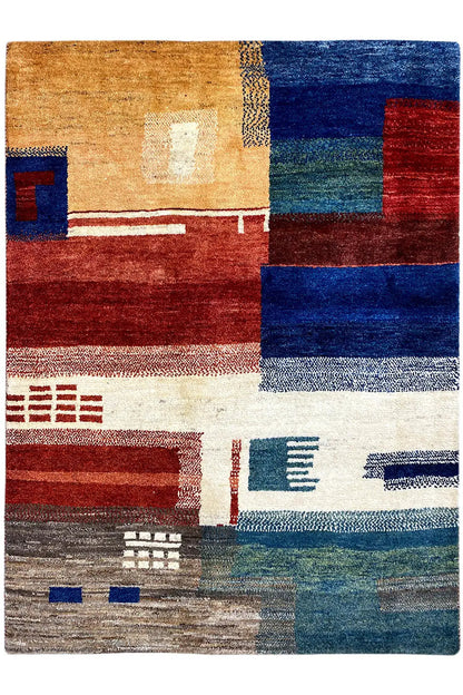 Gabbeh rug front view with patchwork squares and lines in red, blue, and beige