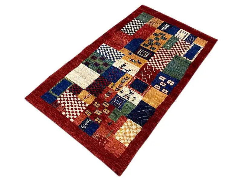 Gabbeh patchwork rug in red with colorful fields, rectangular, angled