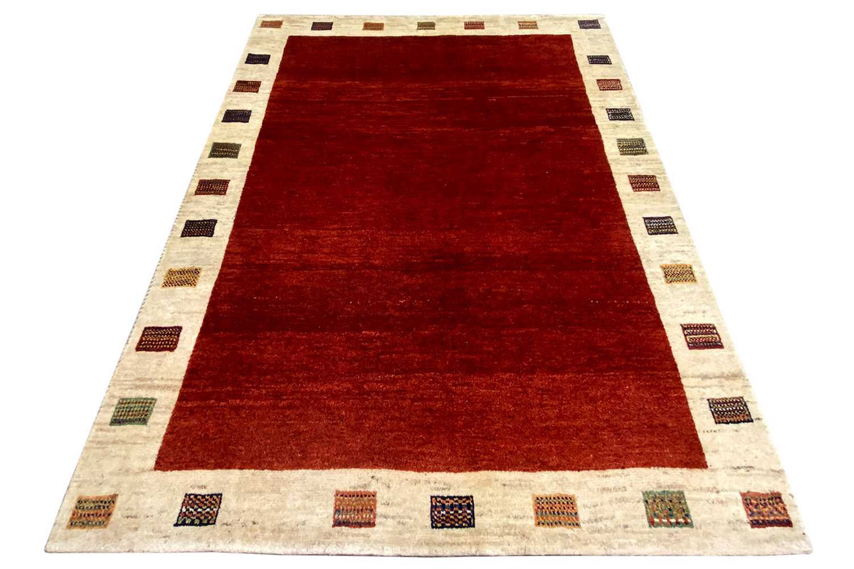 Gabbeh rug 194x155 cm, red rectangular field with multicolored decorative stripes along the edge