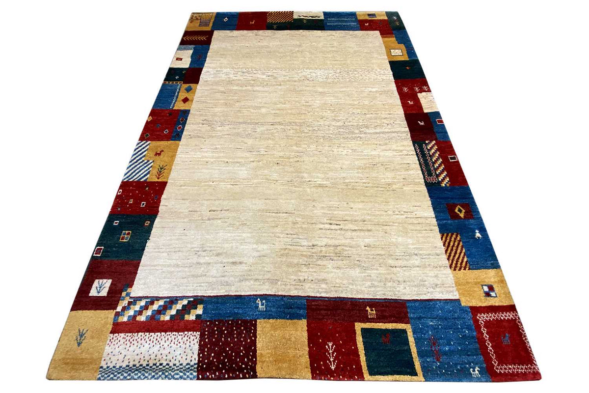 Gabbeh rug 262x177 cm, overall view with a beige center and colorful border motif