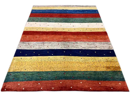Gabbeh rug with a striped pattern in red, blue, green and yellow