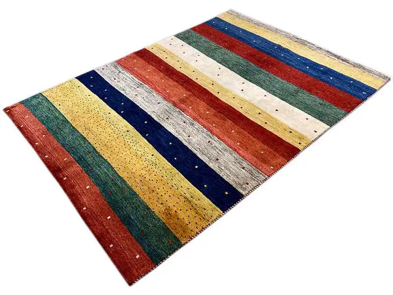 Gabbeh rug with diagonal stripes in red, blue, green, yellow, and beige