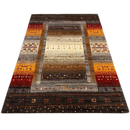 Rectangular Gabbeh rug with a geometric oriental pattern in brown, orange, and beige