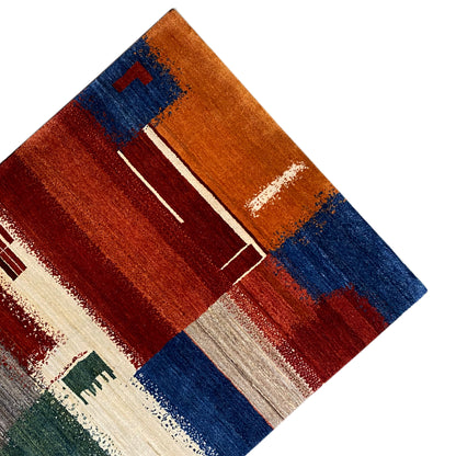 Gabbeh rug 205x154 cm diagonal detail with red, blue, and cream-colored areas