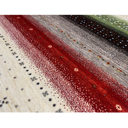 Close-up of a Gabbeh rug: red and gray stripes with fine dotted coloring