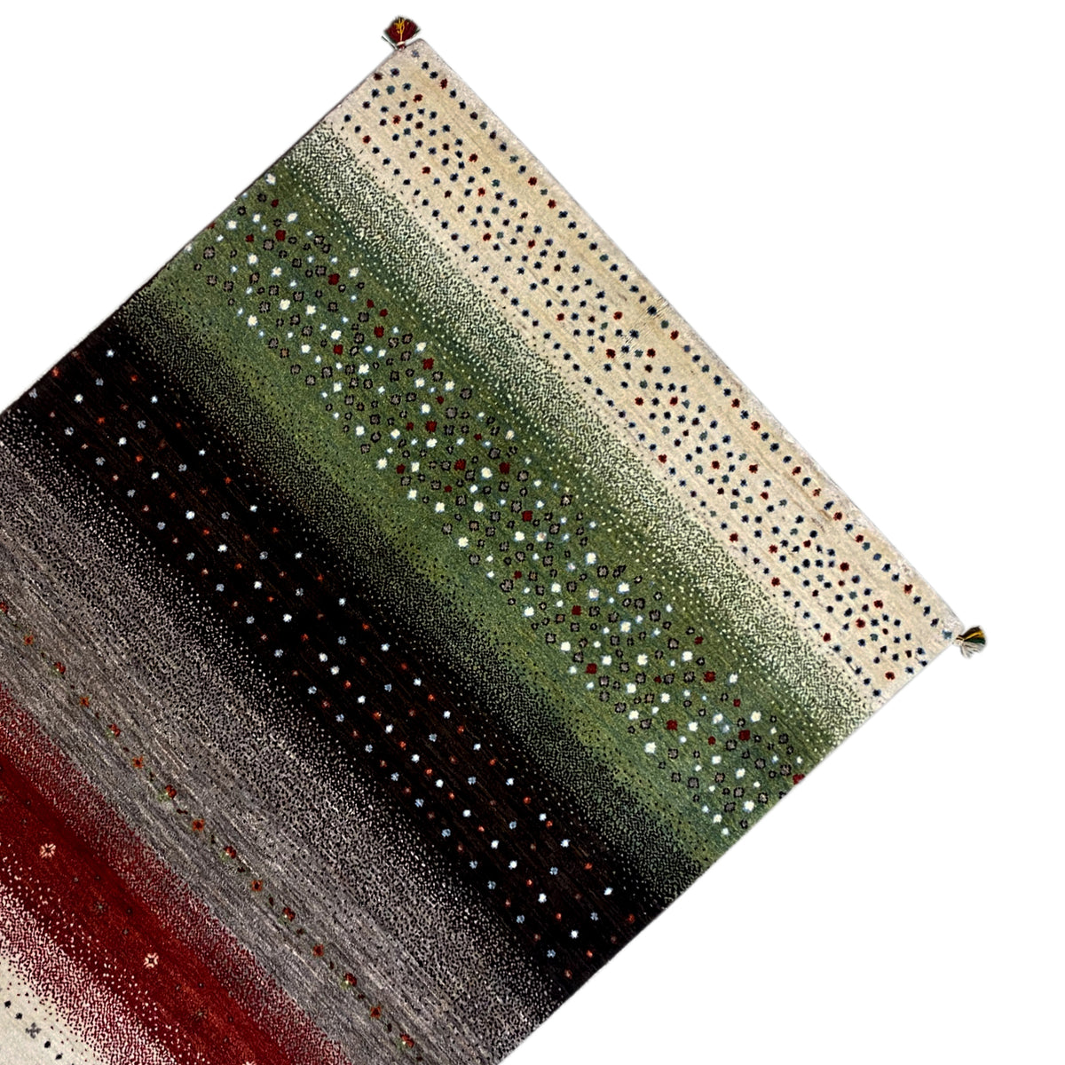 Gabbeh rug in oblique view: green central stripe, dark horizontal stripes, colorful dots
