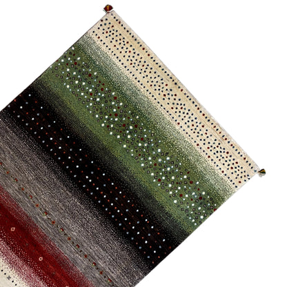 Gabbeh rug in oblique view: green central stripe, dark horizontal stripes, colorful dots