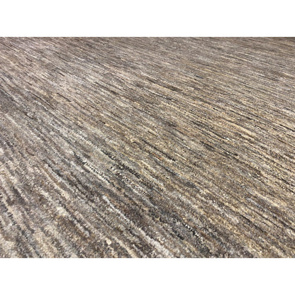 Detail Gabbeh rug: beige mottled pattern with a fine pile texture