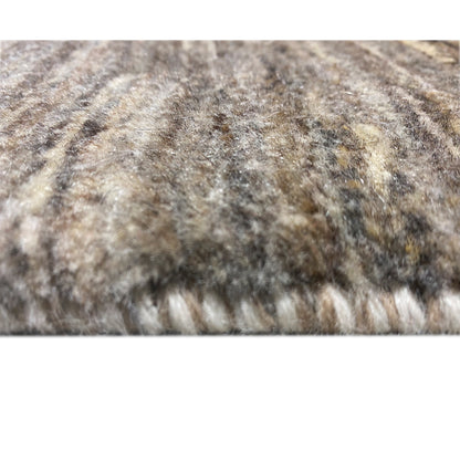 Close-up: beige, heathered carpet with a dense, textured pile surface
