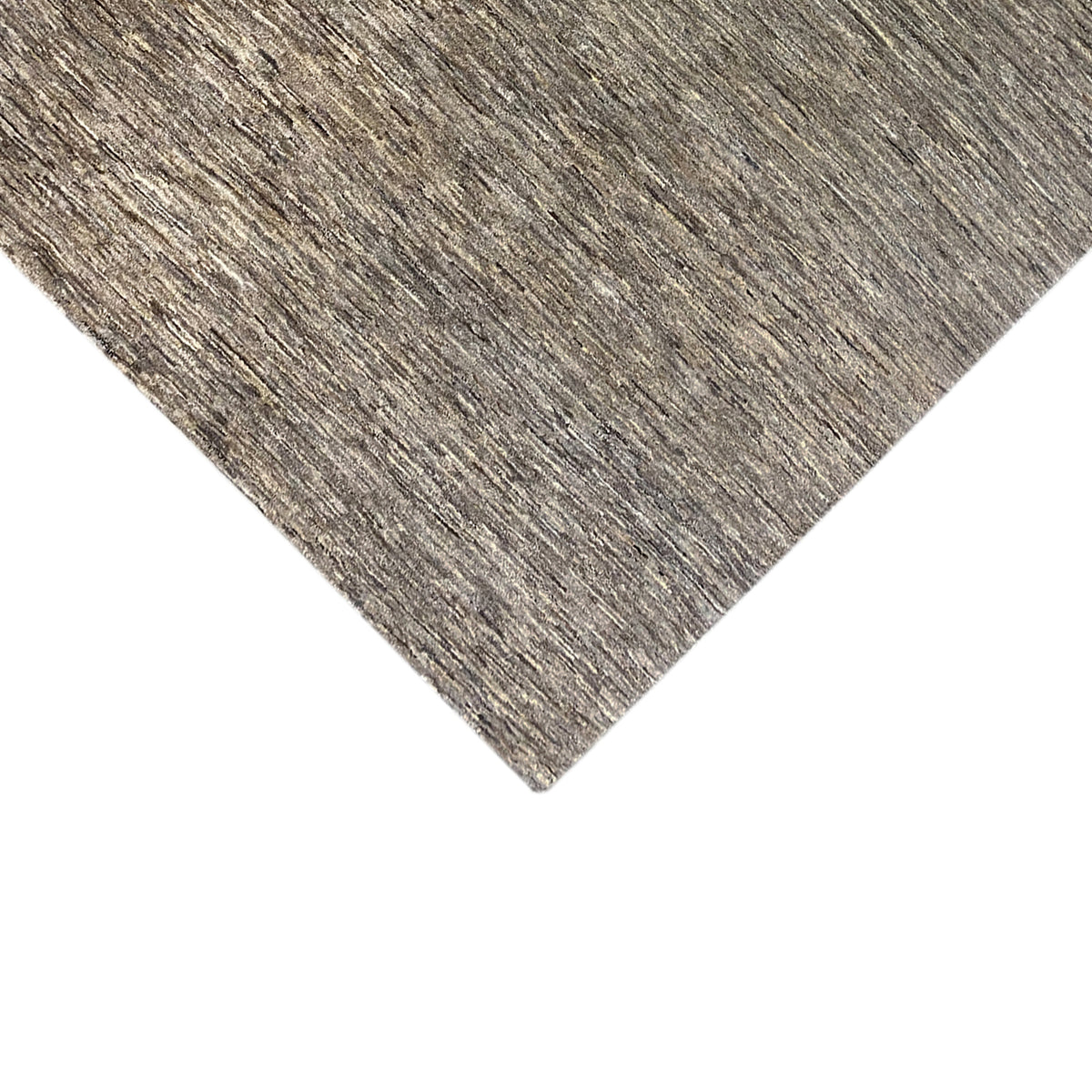 Corner gabbeh rug with a beige mottled weave pattern and dense texture