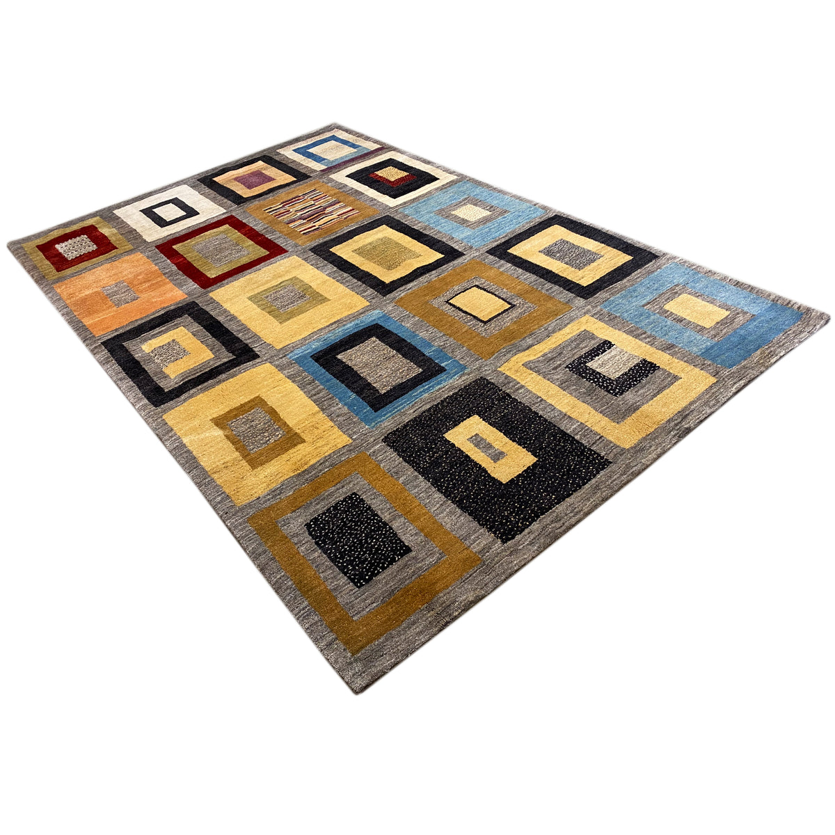 Rug with a geometric square pattern in yellow, blue, and black, featuring many shades
