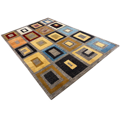 Rug with a geometric square pattern in yellow, blue, and black, featuring many shades