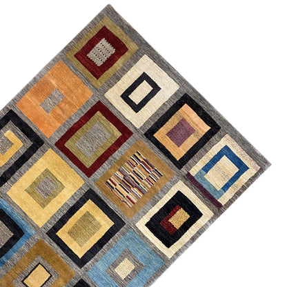 Rug with checkerboard squares in yellow/orange, blue, black, and red