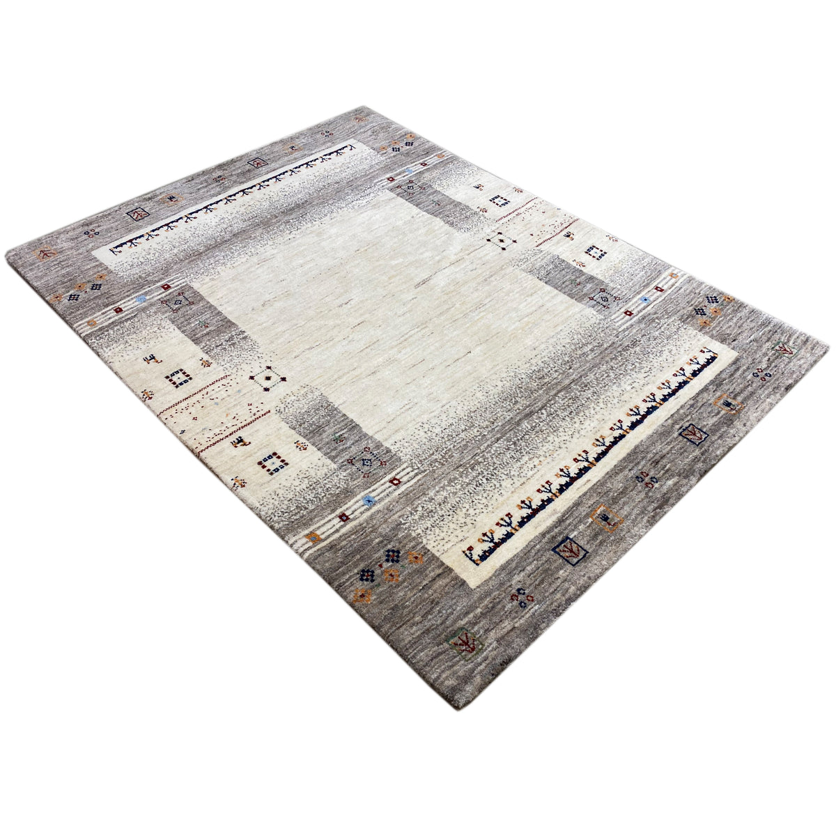 Gabbeh rug in beige and gray, diagonal view with striped textured areas