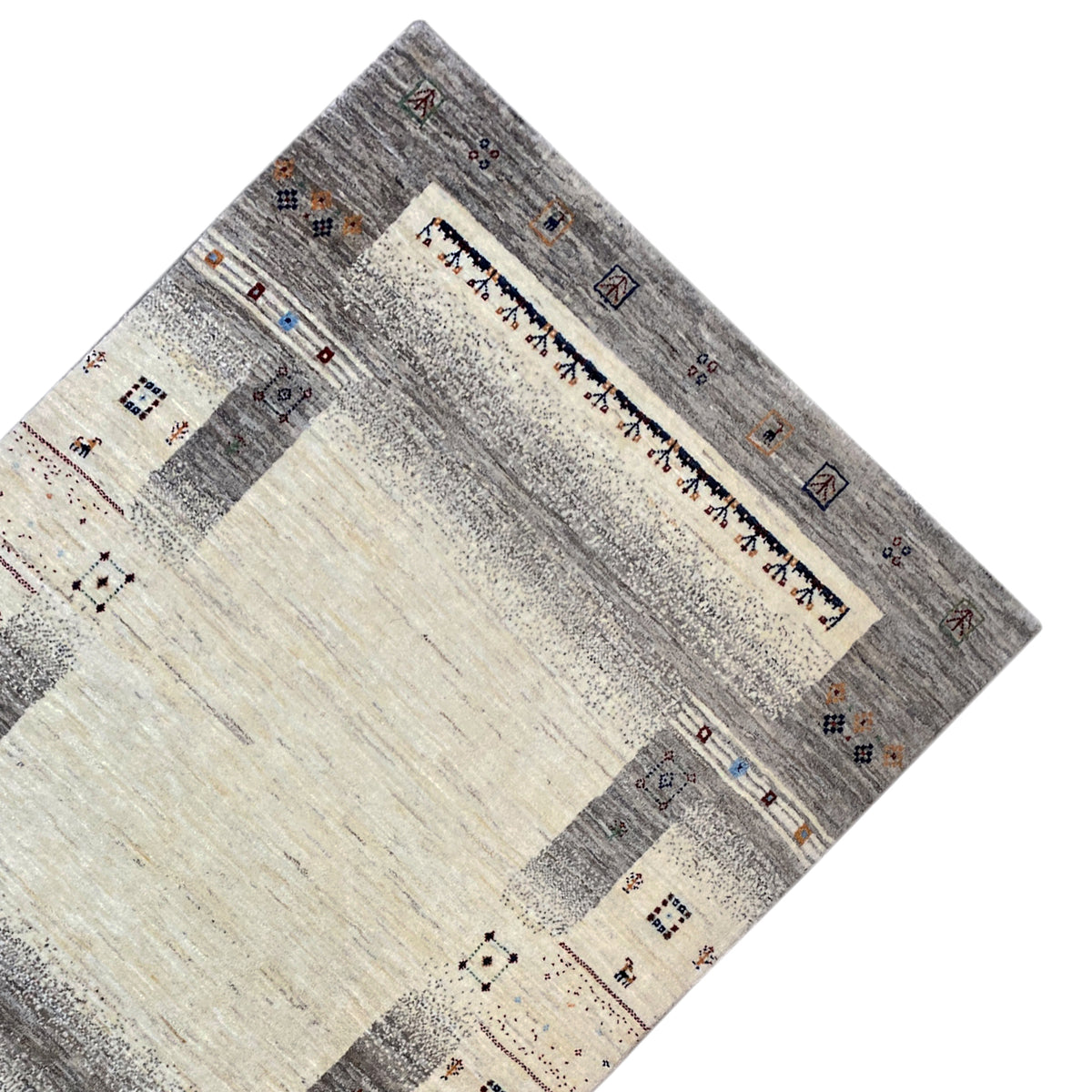 Gabbeh rug in beige/gray, photographed at an angle, with a central stripe and corner motifs