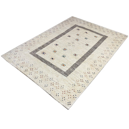 Beige Gabbeh rug with a diagonal design: gray border, diamonds in the center, dot motifs