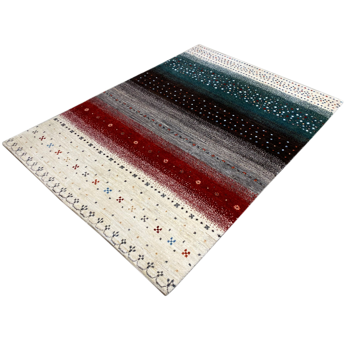 Gabbeh rug at an angle: striped pattern in red, gray, petrol, and cream.