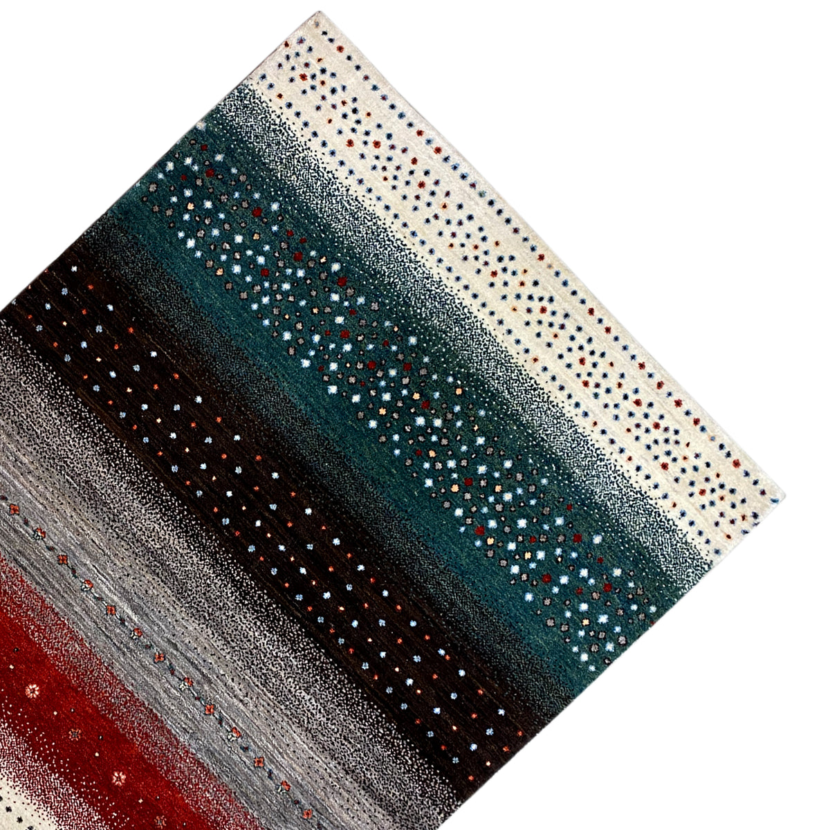 Gabbeh rug viewed from above at an angle: light border stripes, teal, and dark dots in between.