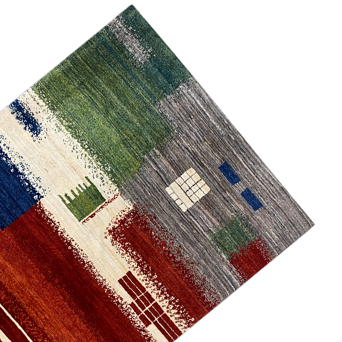 Gabbeh rug corner with a green block, gray-striped area, and blue accents
