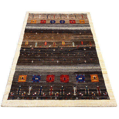 Rectangular rug with a dark brown base, beige border stripes, and colorful sections