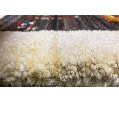 Carpet pile detail: dense, light pile over dark brown woven fabric