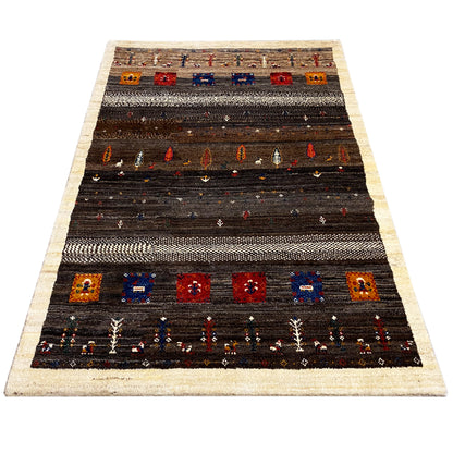 Rug laid diagonally: dark with a beige border and rows of geometric ornaments.