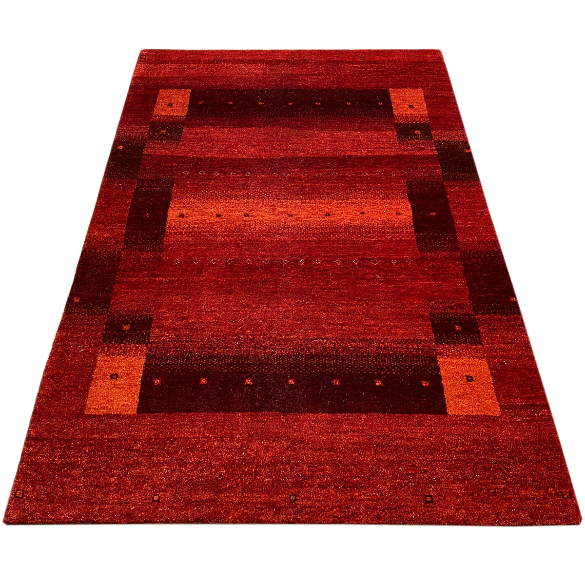Rectangular red Gabbeh rug with a flat pattern featuring dark elements