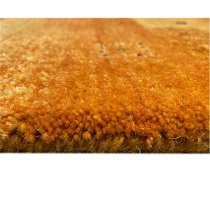 Gabbeh rug in honey brown, detail of the pile height at the edge