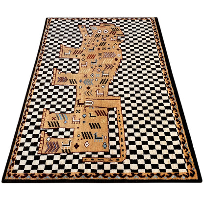 Rug with a Gabbeh pattern: black-and-white checkered design, beige center with figurative ornaments