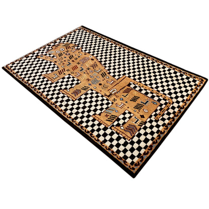 Gabbeh rug in an angled view: black-and-white checkered pattern with a beige inner field and ornaments