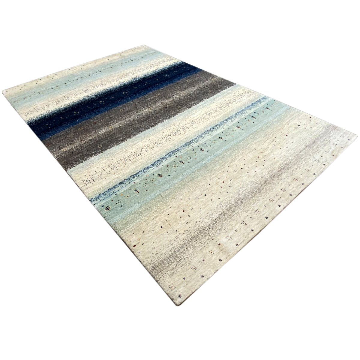 Gabbeh rug in diagonal view: light base with blue and gray stripes