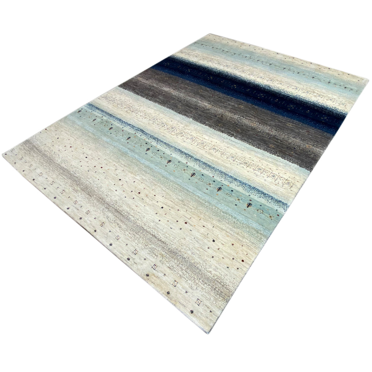 Gabbeh rug with visible edge: light blue-gray stripes, fine textured dots