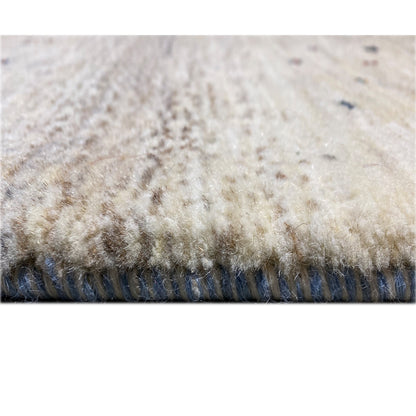 Gabbeh rug detail at the edge: brushed pile with blue edge fringes