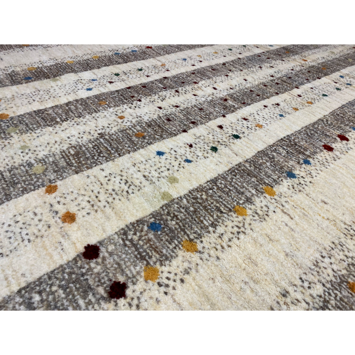 Gabbeh rug 176x118 cm close-up: gray stripes, cream background, colorful dots