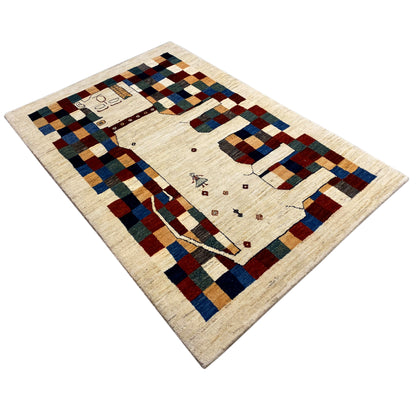 Gabbeh rug 182 x 120 cm, photographed diagonally: beige background with colorful block patterns
