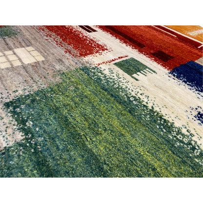Gabbeh rug 186x125 cm close-up: mixed color patches in green, red, and blue on a light background