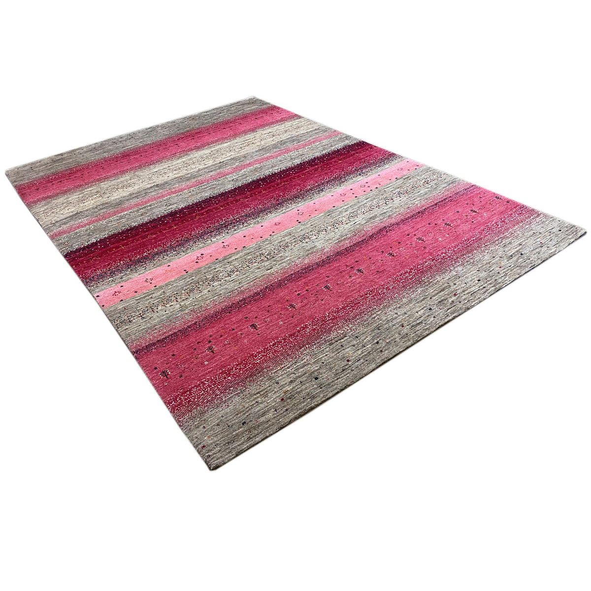 Gabbeh rug in muted pink and gray tones with elongated stripes