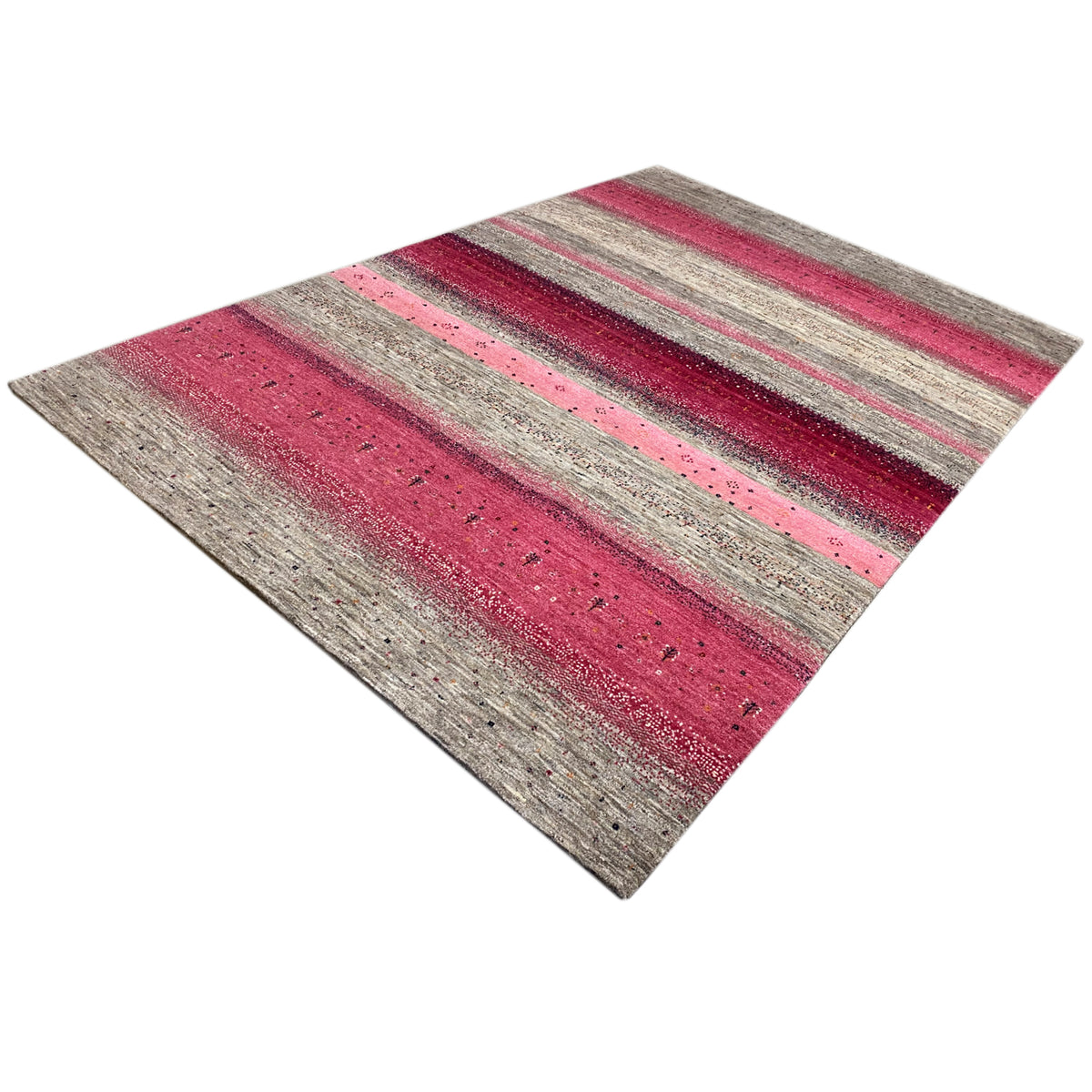 Gabbeh rug in a diagonal pattern: stripes in pink, light gray, and dark gray