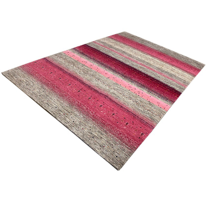 Gabbeh rug in a diagonal pattern: stripes in pink, light gray, and dark gray